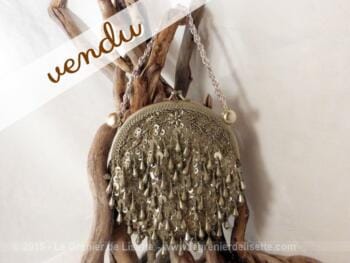 Sac pochette aux perles couleur métal