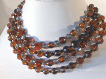 Ancien collier perles de verres couleur ambre sur 4 rangs.
