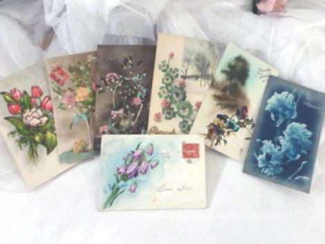 Lot de 7 cartes postales anciennes de fleurs pour souhaiter la Bonne Année .
