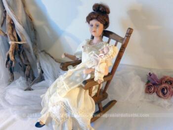 VENDU - Poupée porcelaine et son bébé dans rocking chair