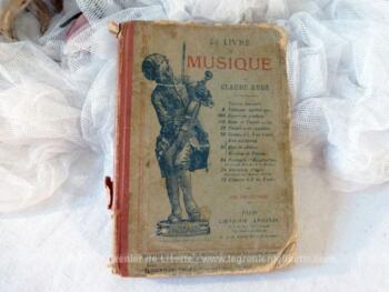Ancien livre "Le Livre de Musique" par Claude Augé de 1889 avec partitions et 220 petites gravures.