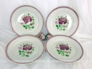 Lot de quatre assiettes plates en demi porcelaine, K.G. Luneville modèle Plombières représentant une rose centrale et un frise de stries sur la bordure. 