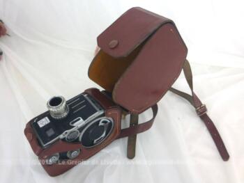 Ancienne caméra Paillard Bolex C8 et sa housse en cuir de fabrication Suisse dans les années 50, pour film en 8mm avec pour objectif un Berthiot Cinor.