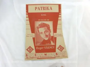 Voici une ancienne partition de la chanson "Patrika" de Roger Varney, copyright de 1945, enregistrée à la Société Editions Musicales Bourcier.