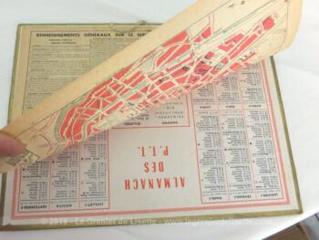 Almanach cartonné des PTT de 1969 avec une photo d'une leçon de chasse d'un coté et le calendrier de l'autre et plus qu'une seule feuille supplémentaire avec le plan de la ville de Nancy.
