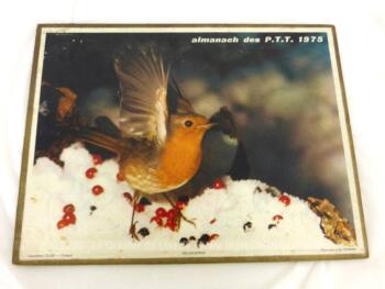 Almanach cartonné des PTT de 1975 avec d'un coté une photo d'un rouge gorge et sur l'autre un enfant et son chien avec 8 feuillets supplémentaires.