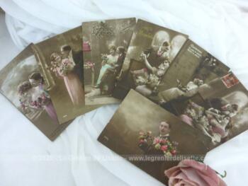 Sept cartes postales couples amoureux début XX° avec des photos sépias très romantiques et colorisées.
