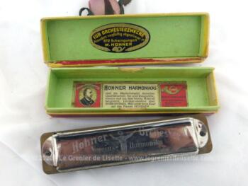 Ancien harmonica Hohner Orchester, Grand Prix 1926 et 1927, avec une très bonne sonorité et sa belle boite en carton d'origine.