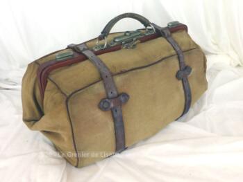 Ancien sac voyage en toile et lanières cuir à la belle forme des anciennes sacoches de docteur.