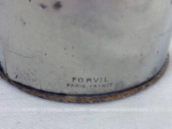 Voici une ancienne boite pour la poudre Forvil à Paris, Parfum 5 Fleurs, au couvercle en métal et corps cartonné.