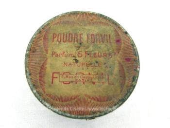 Voici une ancienne boite pour la poudre Forvil à Paris, Parfum 5 Fleurs, au couvercle en métal et corps cartonné.