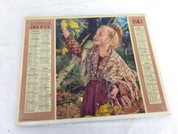 Ancien almanach des PTT de 1963 sur papier cartonné recto et verso, avec photo de la cueillette du mimosa d'un coté et cueillette des cerises de l'autre.