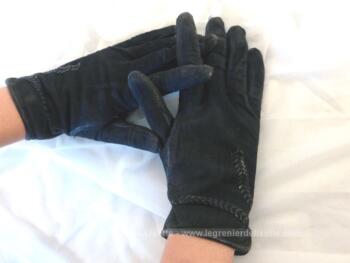 Voici une paire de gants vintage en cuir décorée d'une tresse en cuir de taille standard.