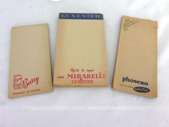 Voici un trio d'anciens blocs-notes, un 