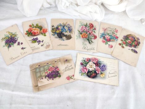 Voici huit anciennes cartes postales datant de 1921 à 1951 et représentant des dessins de bouquet fleurs.