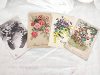 Voici un lot de 4 cartes postales anciennes avec un Fer à Cheval Porte Bonheur.
