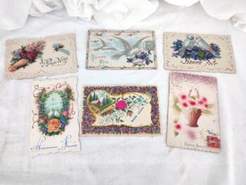 Six anciennes cartes postales datées de 1910, 1912 à 1935 toutes avec une originalité, reliefs, dorure ou bordures ajourées. Superbes !