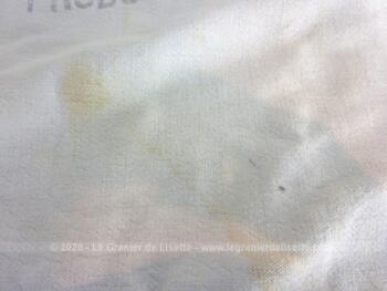 Voici un sac ancien en toile de coton couleur blanc cassé avec l'inscription 