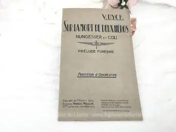 Datant du début des années 1929, voici la partition d'orchestre pour le "Prélude Funèbre sur la Mort de Deux Héros Nungesser et Coli" de V. Dyck sur  32 pages avec portée pour chaque instrument.