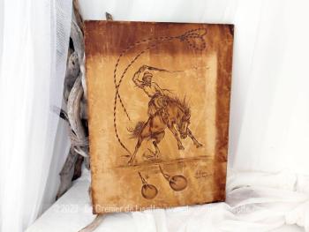 Voici un ancien tableau en cuir collé sur bois représentant un Gaucho Argentin, signé et daté de Tandil en Argentine en 1980.  Pièce unique à encadrer comme vous voulez !