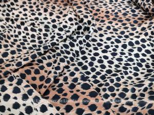 Coupon tissus habillement polyester motif léopard