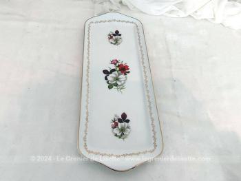 Datant des années 70/80, voici un beau plat à cake en porcelaine estampillé "Véritable Porcelaine Fine France", tendance shabby avec ses décors de fleurs et son guirlande dorée sur tout le pourtour.