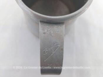 Voici un  petit pichet ancien en alu indiquant 3/4 L et estampillé 