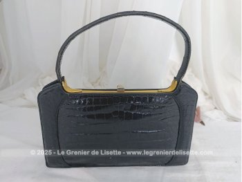 Voici un petit trésor vintage avec ce superbe sac vintage en cuir verni  