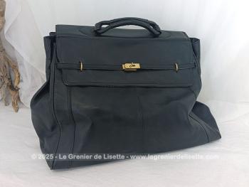 Voici un superbe grand sac de voyage en cuir noir avec une belle forme d'ancienne sacoche de docteur  avec toutes ses poches intérieures et ses 2 grandes ceintures pour fermer le sac.