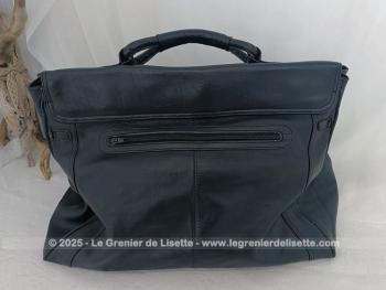 Voici un superbe grand sac de voyage en cuir noir avec une belle forme d'ancienne sacoche de docteur  avec toutes ses poches intérieures et ses 2 grandes ceintures pour fermer le sac.
