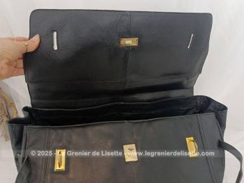 Voici un superbe grand sac de voyage en cuir noir avec une belle forme d'ancienne sacoche de docteur  avec toutes ses poches intérieures et ses 2 grandes ceintures pour fermer le sac.