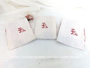 Lot 3 grandes serviettes décors rouges monogramme L