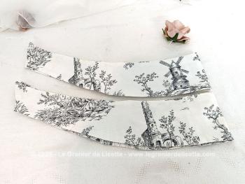 Voici une paire de belles embrasses en tissus tendance toile Jouy Gris avec anneau d'accroche aux deux extrémités . Superbes ! 