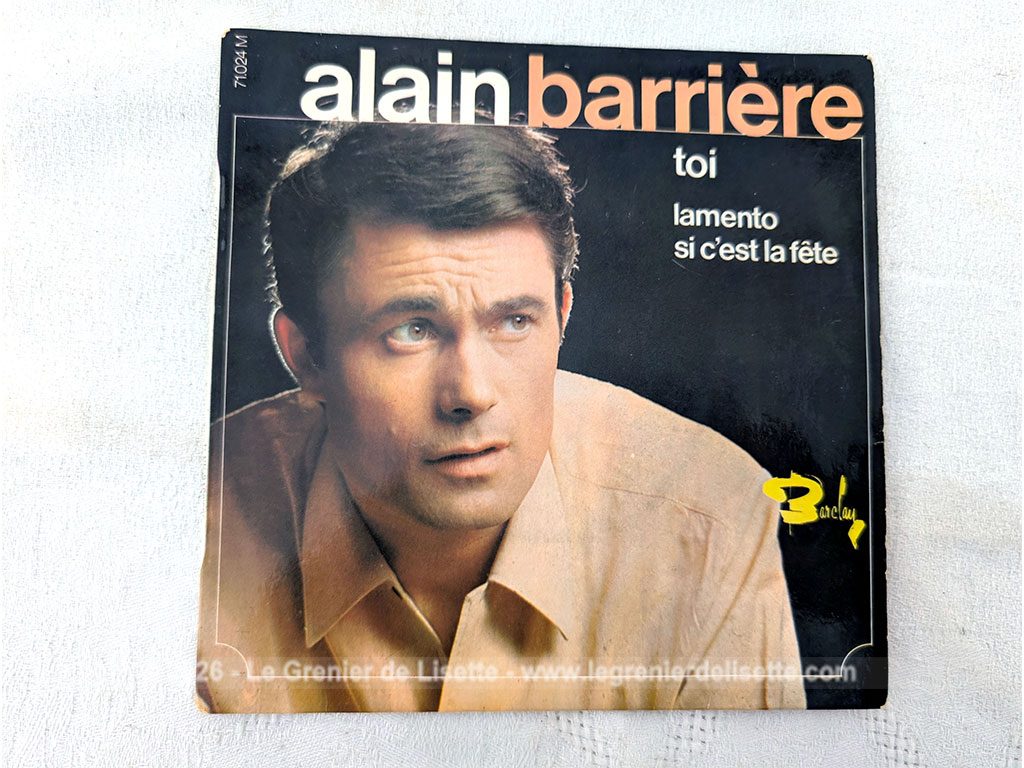 Voici un disque 45T Alain Barrière des années 60 avec 3 titres, dont le plus célèbre est