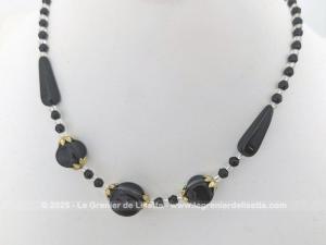 Beau ras de cou perles verre noires et translucides